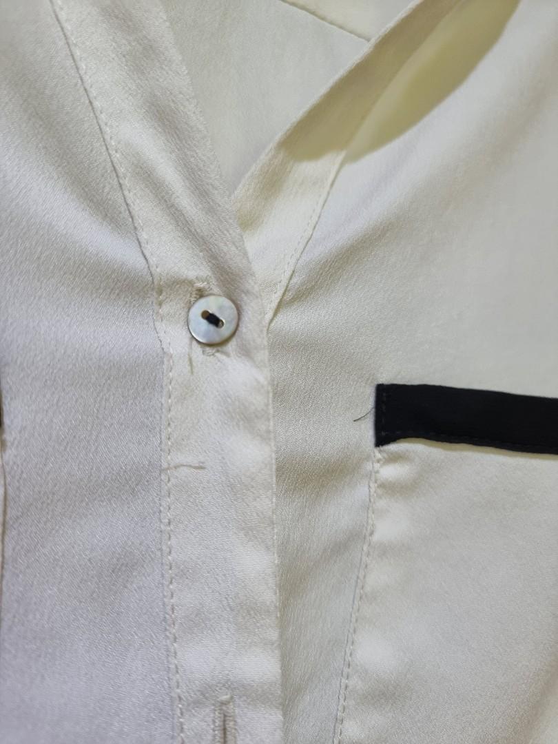 Zara Long Sleeve Satin Blouse (Category: Blouses) located in Manila. Submitted by decluttermystuff21 (Listing ID 1141723876, Image 3). Description: Long Sleeve Satin Blouse Brand: Zara Size: Mediun Condition: Used, needs to be washed to whiten again.