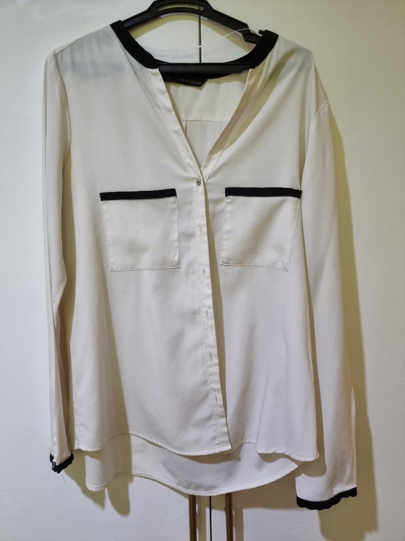 Zara Long Sleeve Satin Blouse (Category: Blouses) located in Manila. Submitted by decluttermystuff21 (Listing ID 1141723876, Image 1). Description: Long Sleeve Satin Blouse Brand: Zara Size: Mediun Condition: Used, needs to be washed to whiten again.