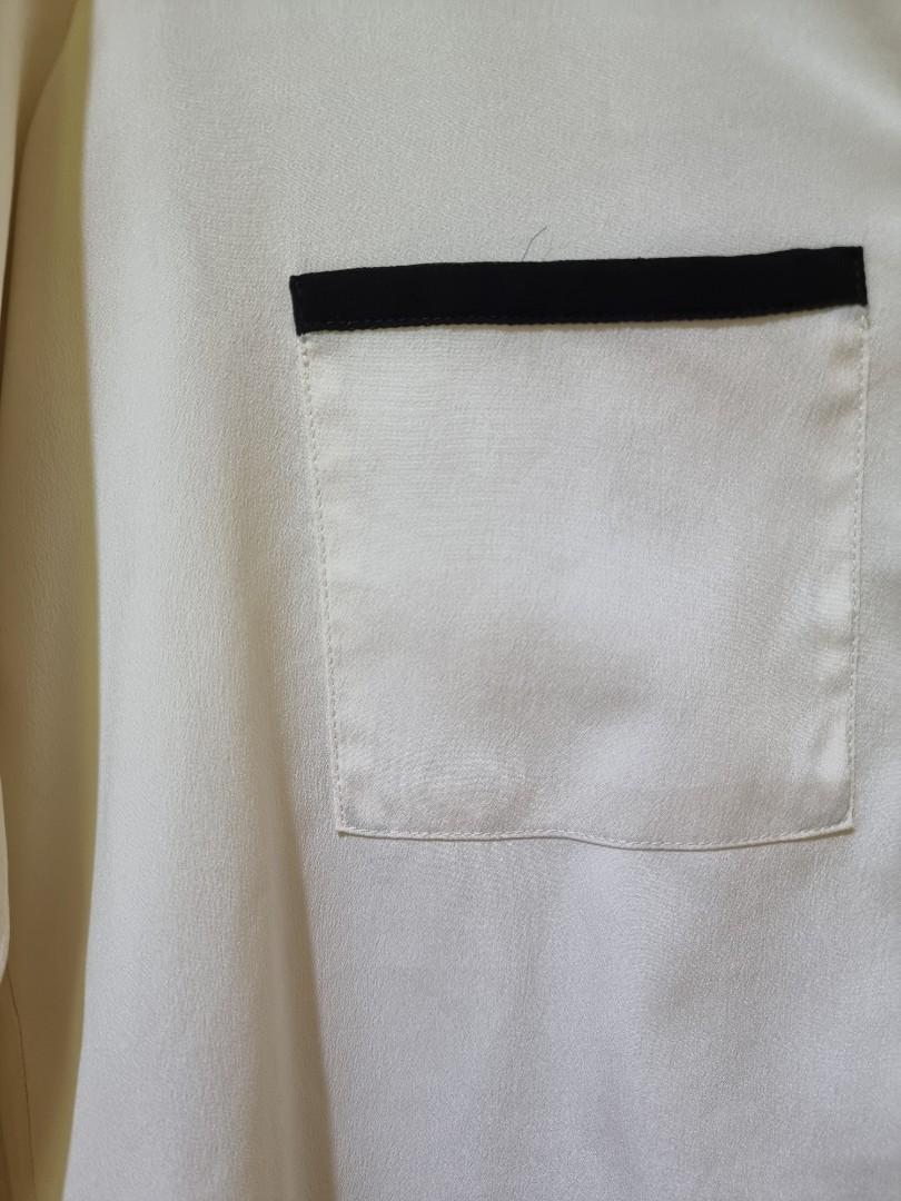 Zara Long Sleeve Satin Blouse (Category: Blouses) located in Manila. Submitted by decluttermystuff21 (Listing ID 1141723876, Image 2). Description: Long Sleeve Satin Blouse Brand: Zara Size: Mediun Condition: Used, needs to be washed to whiten again.