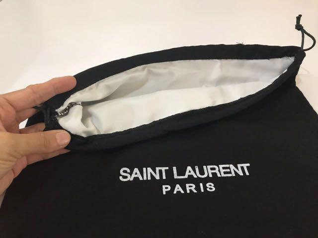 Saint laurent dust sales bag real vs fake