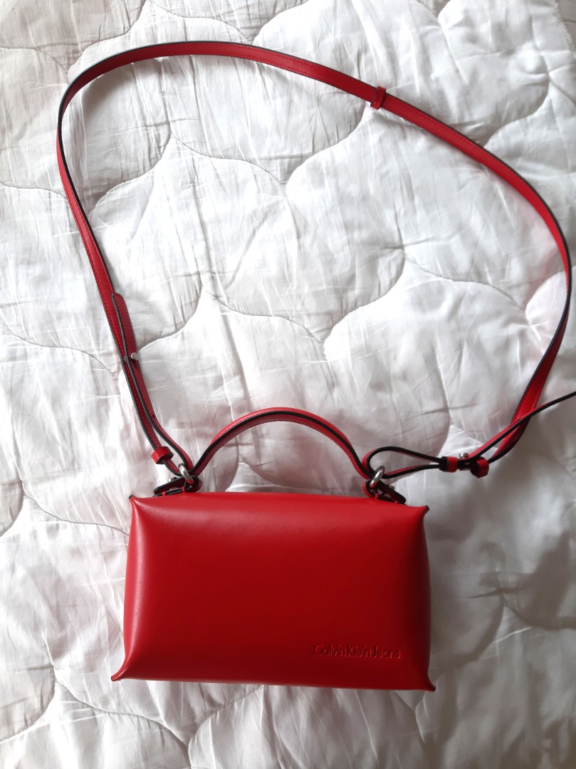 Calvin Klein Red Sling Bag (free postage), Luxury, Bags & Wallets on  Carousell