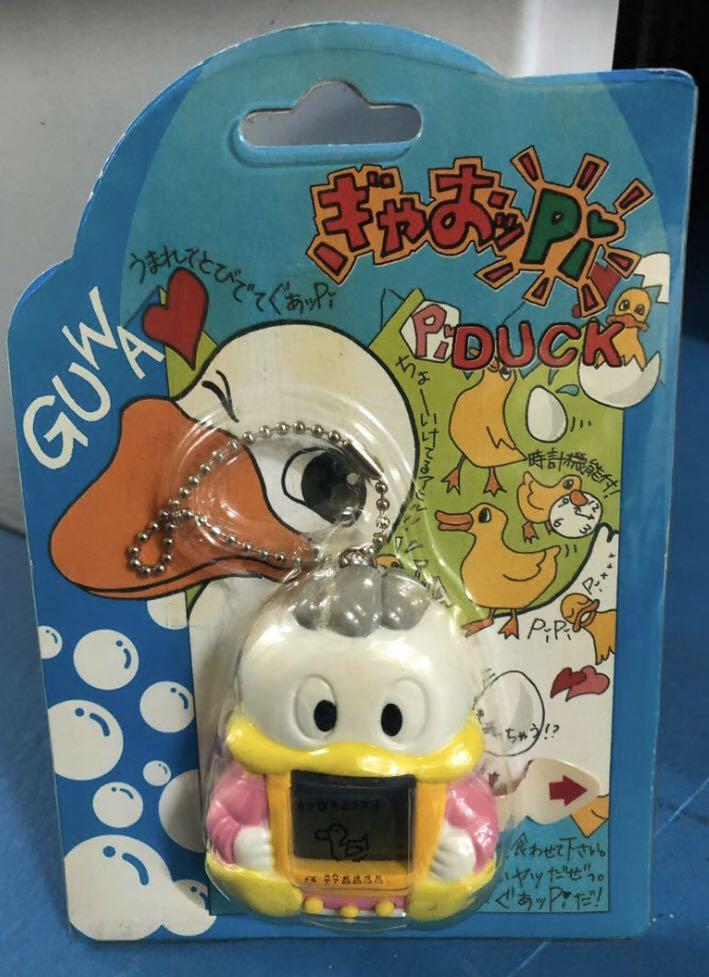 FREE TRACKED SHIPPING AND NEW AND UNUSED! Vintage Guwa Guappi Pi / Gyaoppi Duck - Tamagotchi electronic pet (Category: Vintage Collectibles) located in Singapore. Submitted by kobe78 (Listing ID 1142037759, Image 1). Description: Rare Gyaoppi Duck tamagotchi. New and in original packaging and with Japanese instruction manual. Perfect for tamagotchi collectors. Ships free with smartpac. .