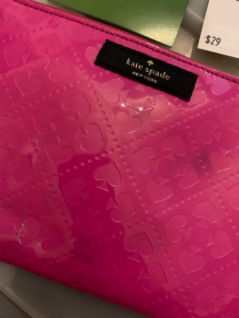 Kate Spade mini pouch - hot pink (Category: Luxury Bags & Wallets) located in Mandaluyong City. Submitted by amvvg (Listing ID 1142012676, Image 2). Description: Kate Spade mini pouch - hot pink with care card and tag Authentic from US All pictures posted Stored only not used but with stains from storage as seen in posted pic Selling for only 1150 Rfs: Decluttering For pickup in Mandaluyong.