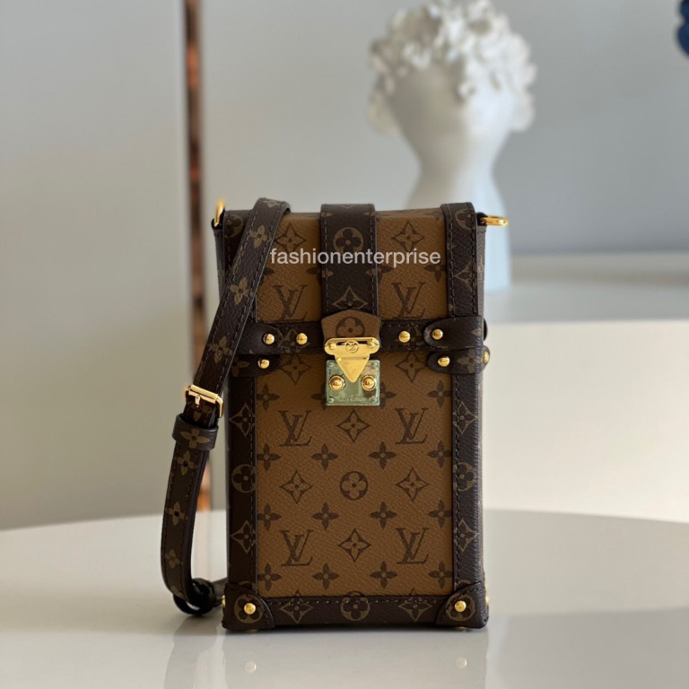 Louis Vuitton Vertical Trunk Pochette Monogram Reverse Canvas, Men's  Fashion, Bags, Belt bags, Clutches and Pouches on Carousell