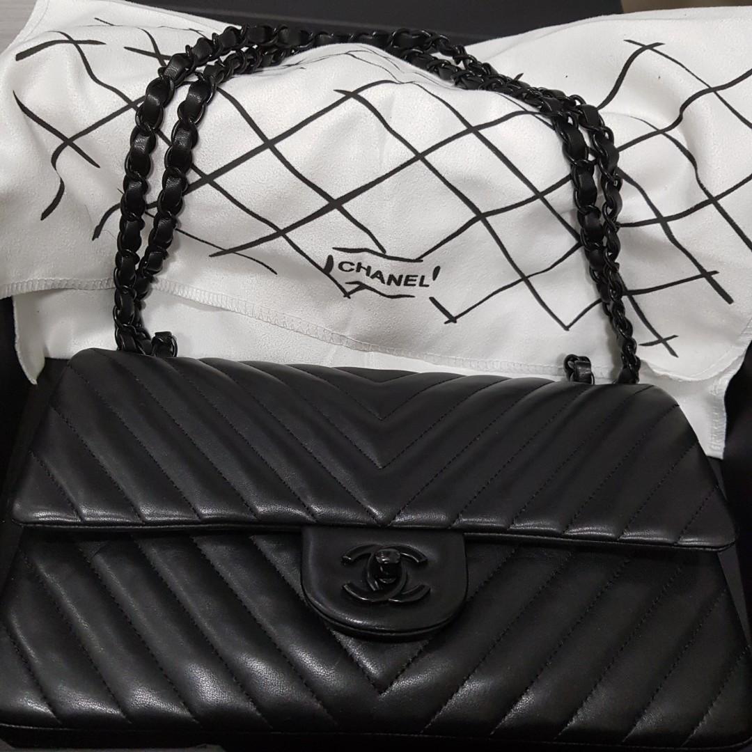 So black Chanel medium chevron classic flap leather bag limited