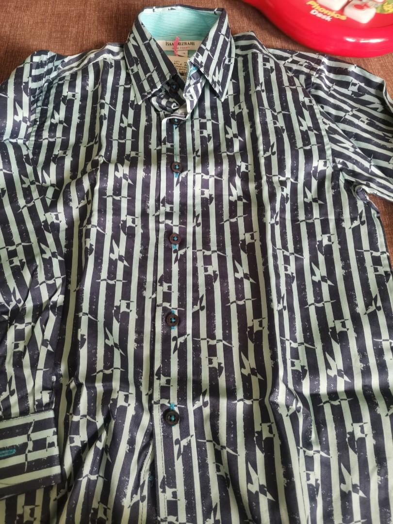 Striped Blue Polo Shirt (Category: Babies & Kids Fashion) located in Antipolo. Submitted by mysnarkles (Listing ID 1142055626, Image 3). Description: Authentic US-bought Size 7 Isaac Mizrahi original price is 3k++ supposed to be a gift but was not able to give it Please check photos for measurements.