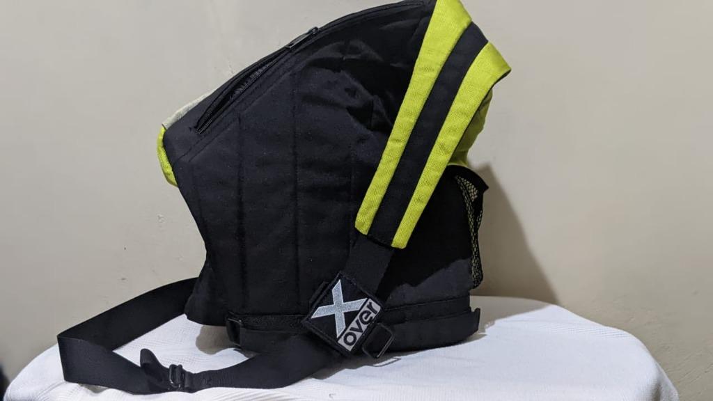 X over tas top
