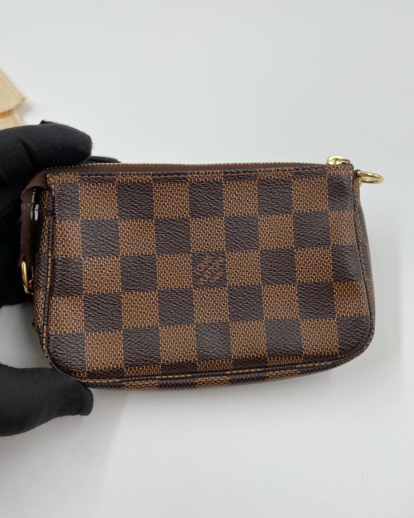 Louis vuitton damier ebene mini pochette store