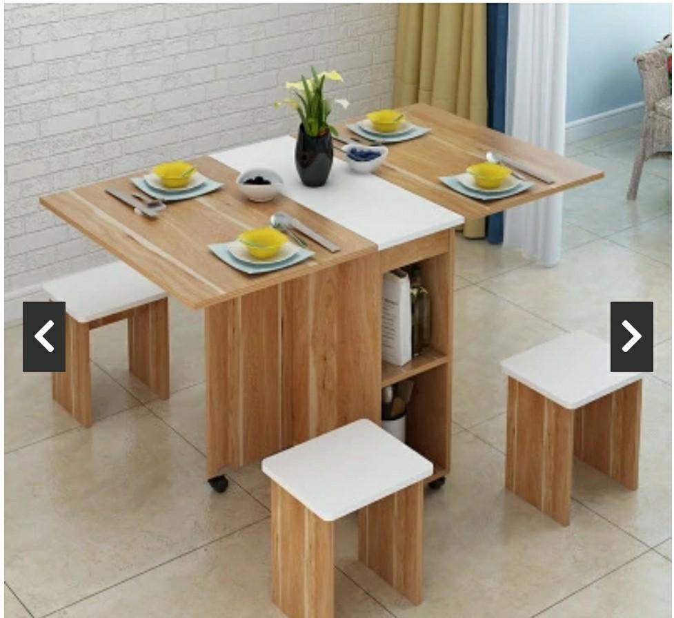 Foldable Dining Table (Category: Tables & Sets) located in Quezon City. Submitted by vylalvyl (Listing ID 1142433088, Image 1). Description: High quality wood materials used Dinning table with four chairs set Double folding, thickened plate, and stable support The expansion can be used for 4-6 people Practical space-saving, not spacious Double layer racks for plates, bowls, or any small objects With universal wheel design for free movement and ea
