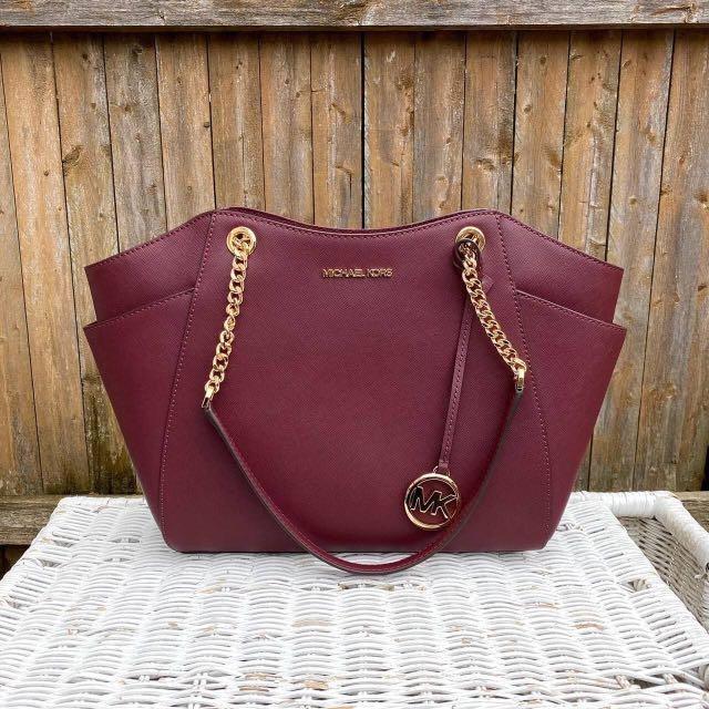 Michael Kors Jet Set Travel Large Chain Shoulder Tote in Maroon, Women's  Fashion, Bags & Wallets, Tote Bags on Carousell