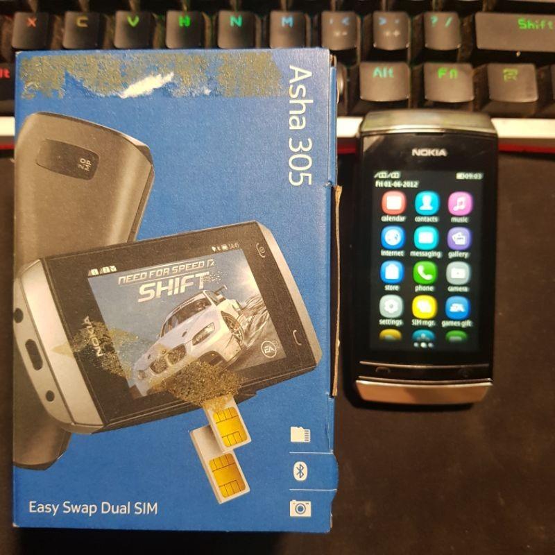 Nokia Asha 305 Collectible Complete Package *07461 (Category: Android Others) located in Manila. Submitted by mikaaaaaaaa (Listing ID 1142412858, Image 2). Description: Nokia Asha 305 Collectible Complete Package *07461 10MB ROM | 32MB RAM Color: Silver 3 Inches TFT Display 1000 mAh Li-Ion Battery NTC Approved 100% Original 100% Local Released Good Unit | Good as New.
