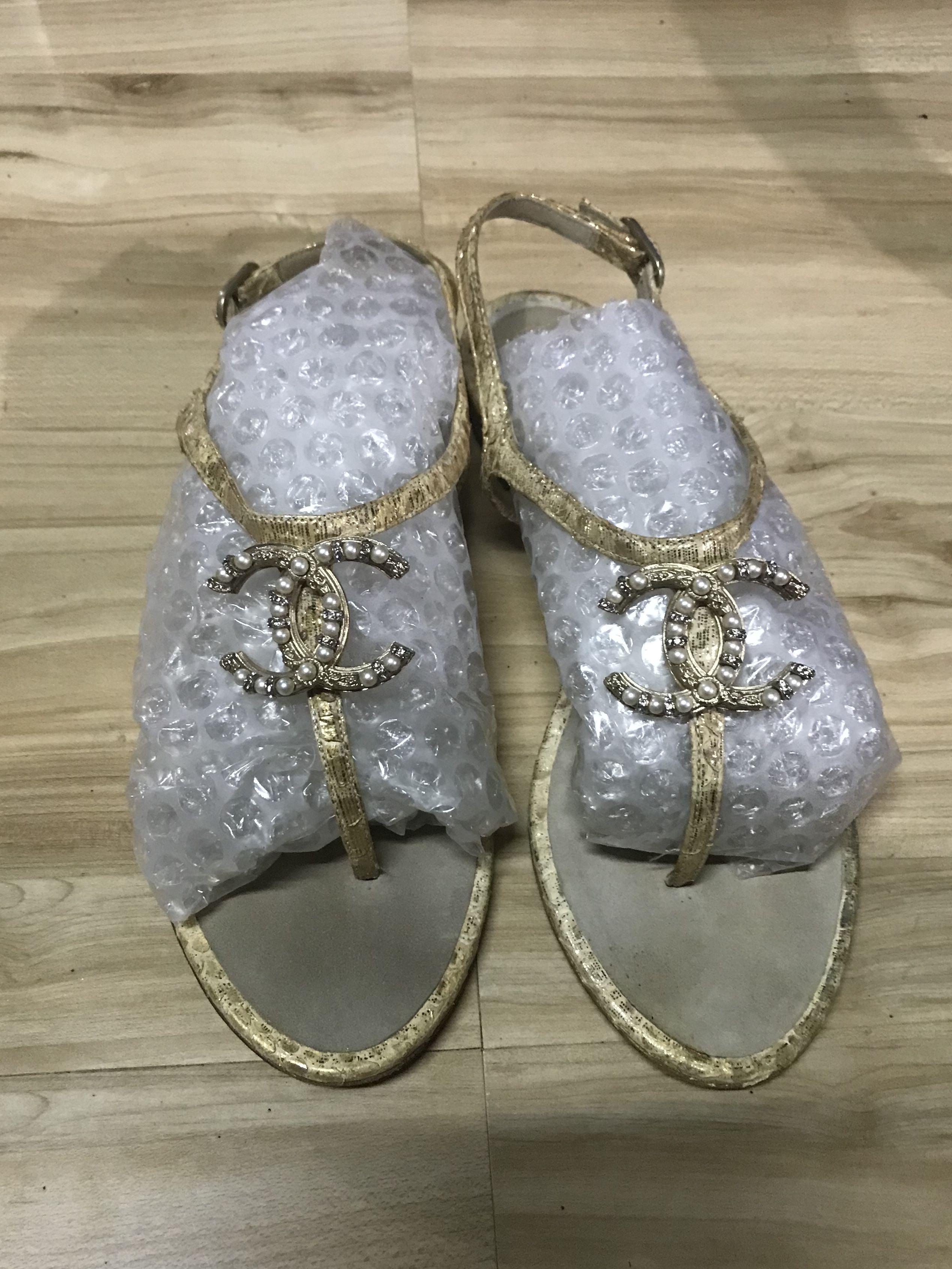 Chanel logo flat sandals