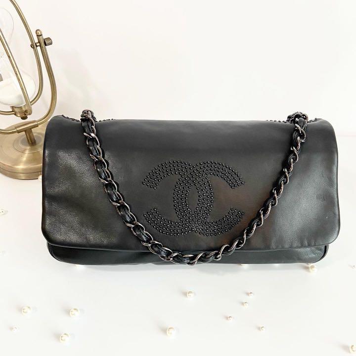 Authentic Chanel Black Lambskin Studded CC East West Flap Bag