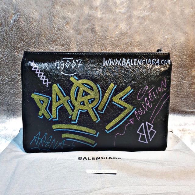Balenciaga clutch graffiti store