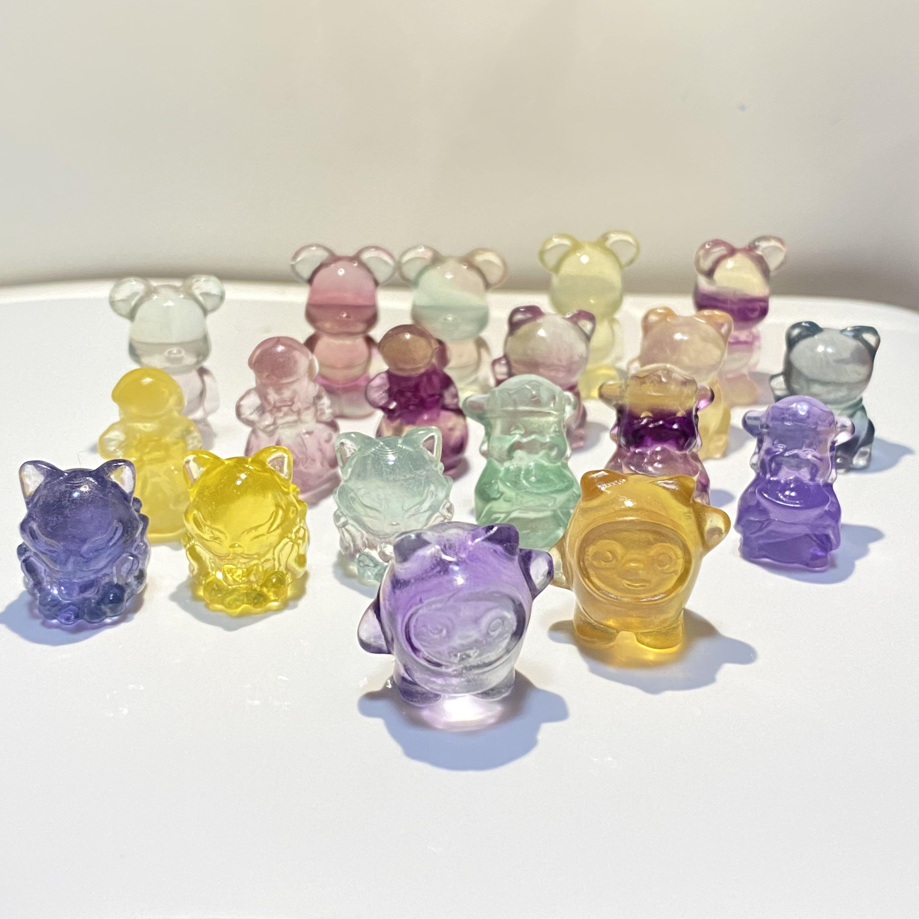Fluorite display characters (Category: Precious Stones) located in Singapore. Submitted by jvgsw05 (Listing ID 1112415421, Image 1). Description: Fluorite is multi-colored mineral known for its powerful energetic healing properties and mesmerising physical beauty. The fluorite stone received its name from the fluorescent luminance that it emits when held under certain angles of UV light, giving it a magical glowing appearance. This enigmatic crys