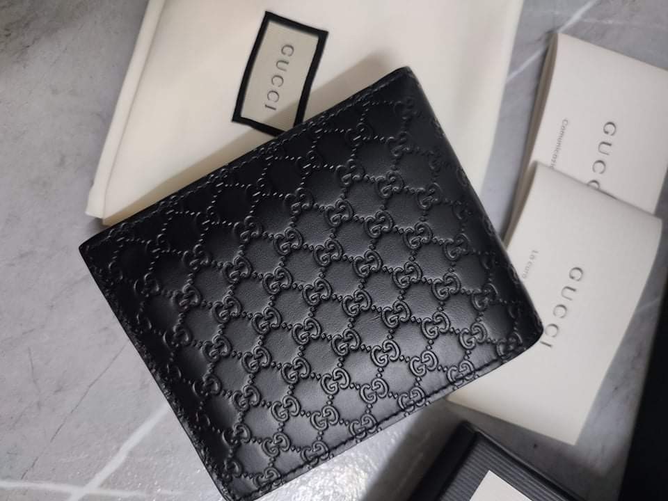 Gucci Microguccissima Bifold wallet Black, Luxury, Bags & Wallets on  Carousell