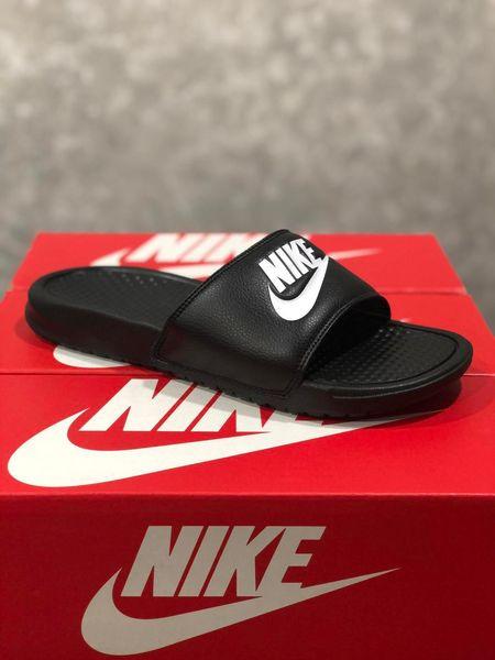 Nike benassi black and white slides best sale