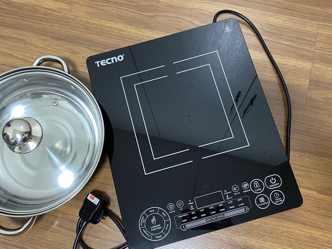 Fancy induction cooker has cooktops that work even when wet but includes  an extra touchpad for the rarely used settings that shut down the entire  cooker if they get wet (including while
