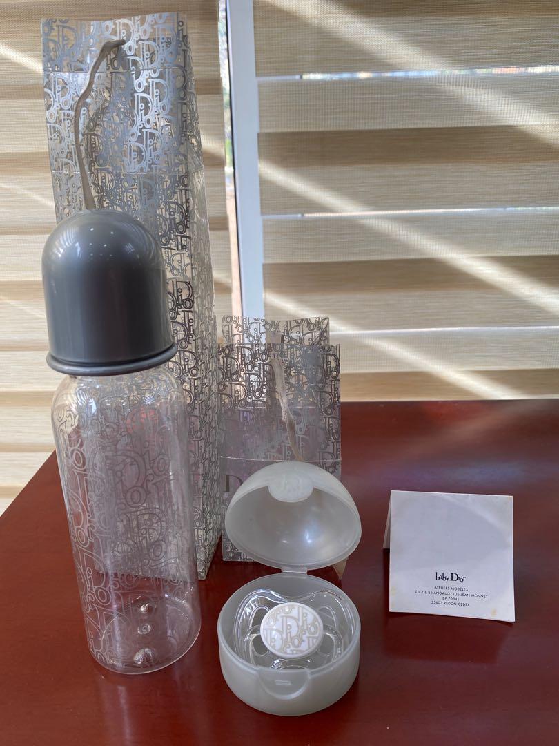 Dior baby bottles and sales dummies