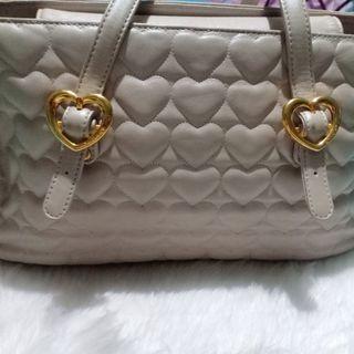 lovecat sling bolsa price