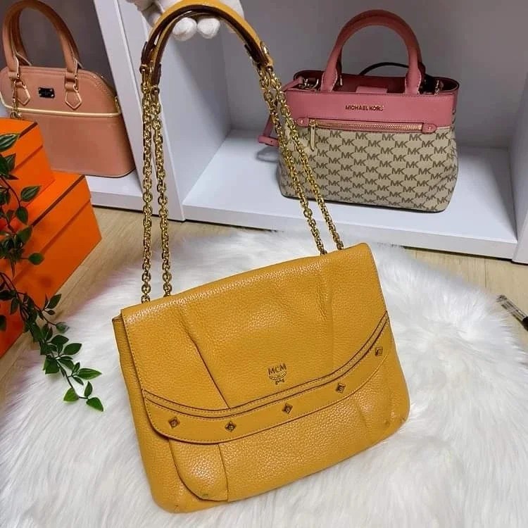 MCM CHAIN YELLOW, Luxury, Bags & Wallets on Carousell