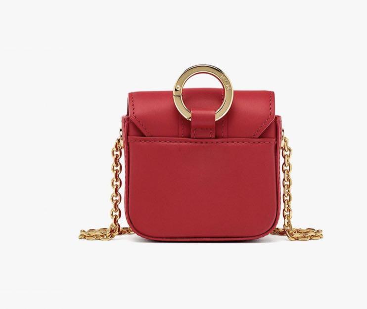 Red bag on sale charm