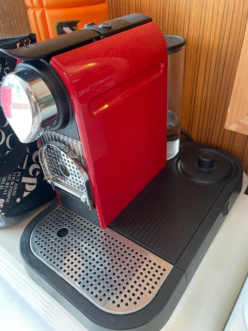 https://media.karousell.com/media/photos/products/2022/3/10/nespresso_machine_red_with_mil_1646885383_4b6732b2_progressive.jpg