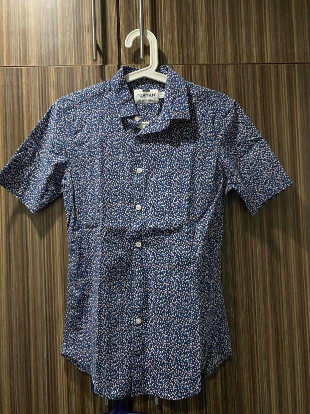 Topman Print Polo (Category: Tshirts & Polo Shirts ) located in Marikina City. Submitted by lienonerom (Listing ID 1148206022, Image 1). Description: Authentic Topman print polo Color: Blue Size: US S; slim fit Condition: 9/10 (seldomly used).