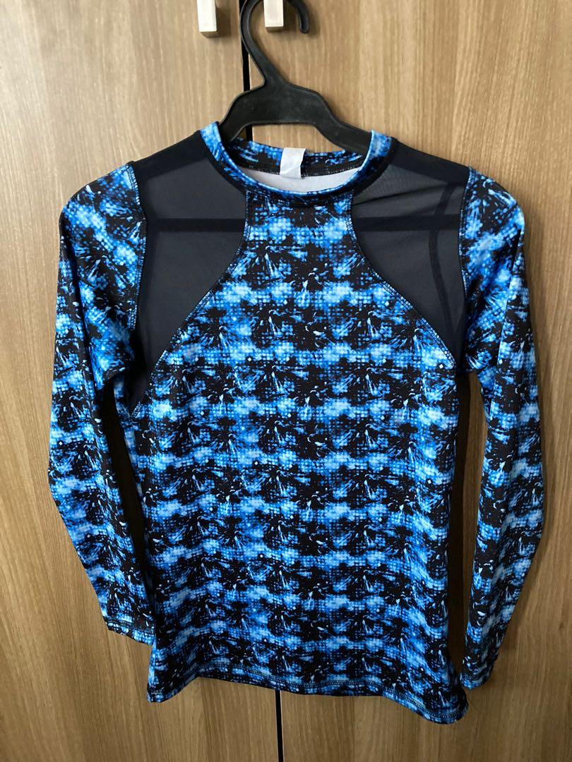 Blue rash guard -see through (Category: Rash guard) located in Quezon City. Submitted by cherish_stuff (Listing ID 1148457833, Image 1). Description: Almost new.
