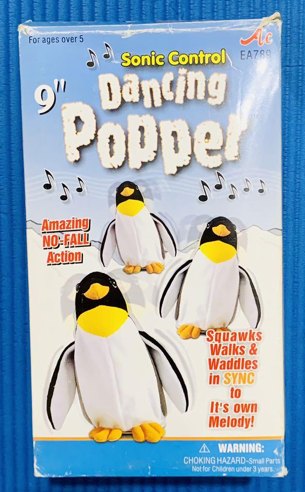 Dancing Popper Penguin (No Fall) (Category: Interactive Toys) located in Quezon City. Submitted by chosenjuan05 (Listing ID 1148539790, Image 2). Description: ****RUSH SALE SALE SALE RUSH**** Dancing Popper Penguin (No Fall) 9262A Dancing Popper. 9" battery operated, sound activated penguin that talks, walks & waddles on tables and counters without falling off the edge! Requires 3 "AA" batteries. Box size: 4.25"Wx9.25"Hx4.25"D. Case pack: 24 pcs.