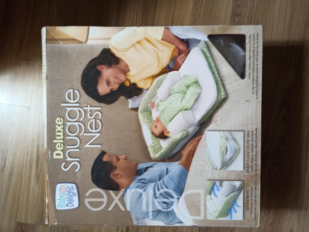 Baby deluxe snuggle nest on sale