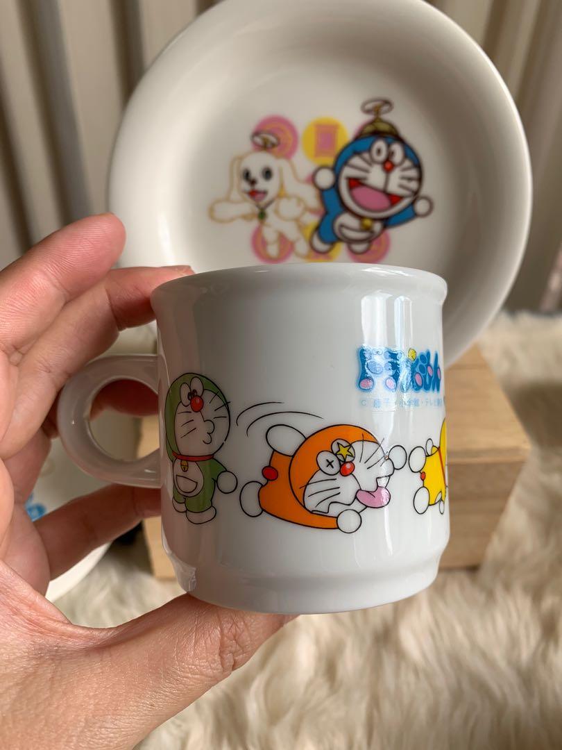 Doraemon cup (Category: Coffee & Tea Tableware) located in Calamba. Submitted by cur8d (Listing ID 1148433871, Image 3). Description: saucer 80 - sold cup 150 .