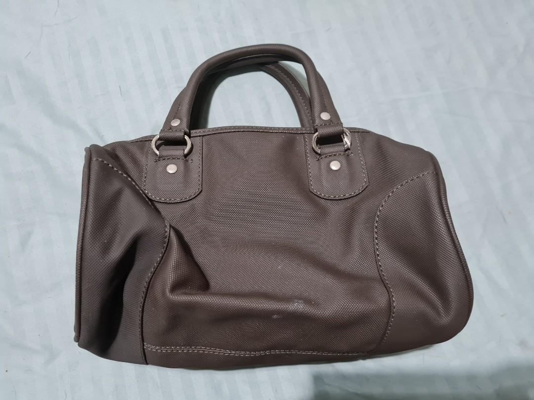 Lacoste Bag Original with tag price (Category: Purses & Pouches) located in Las Pinas. Submitted by jomabeth (Listing ID 1148631499, Image 2). Description: old lacoste bag original with original price tag attached.