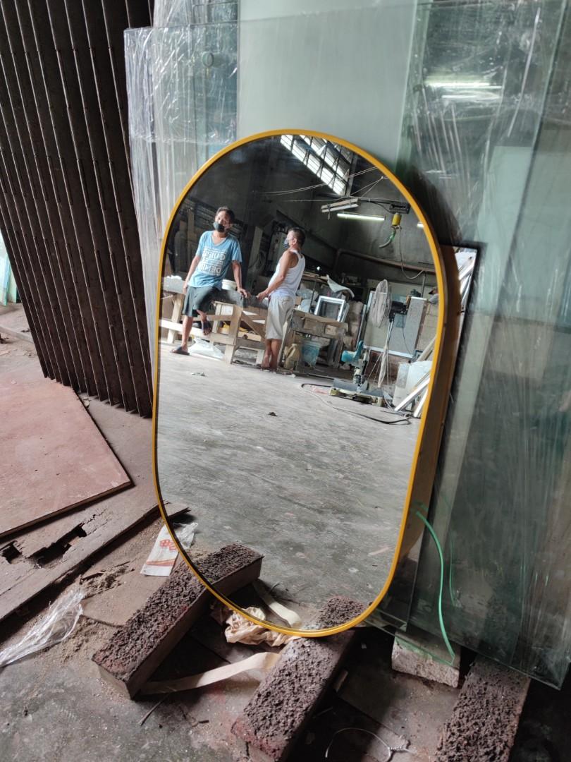 Oval mirror with frame (Category: Mirrors) located in Malabon City. Submitted by mirrors.ph (Listing ID 1148484854, Image 2). Description: Oval mirror with gold aluminum frame and plywood backing. Using 6mm thick copper free lead free mirror. Size: 1.5ft x 2.5ft P1012.50 Add P200 if with back hook. Available colors gold, glossy black, matte black, white and silver aluminum frame Customize sizes and shapes are welcome..