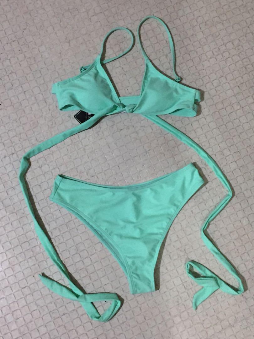 Shein mint green 2 piece bikini swimsuit (Category: Bikinis & Swimsuits) located in Manila. Submitted by thriftergurll (Listing ID 1148507392, Image 1). Description: Fits s-m Mop: gcash/bpi Mod: any courier you prefer.