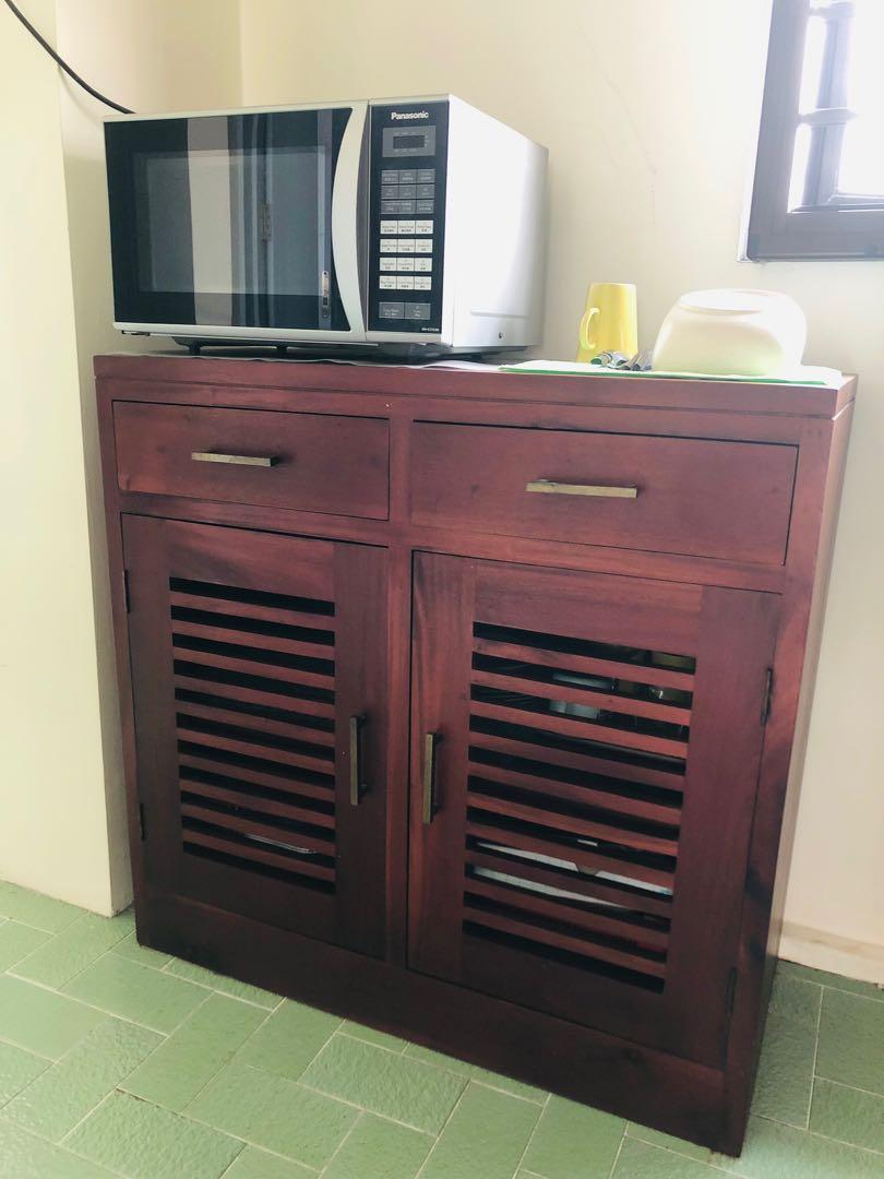 Solid Teak Cabinet (Category: Shelves, Cabinets & Racks) located in Singapore. Submitted by monstercl (Listing ID 1148565607, Image 1). Description: Wonderful teak wood piece like new. Solid quality piece bought at $600..