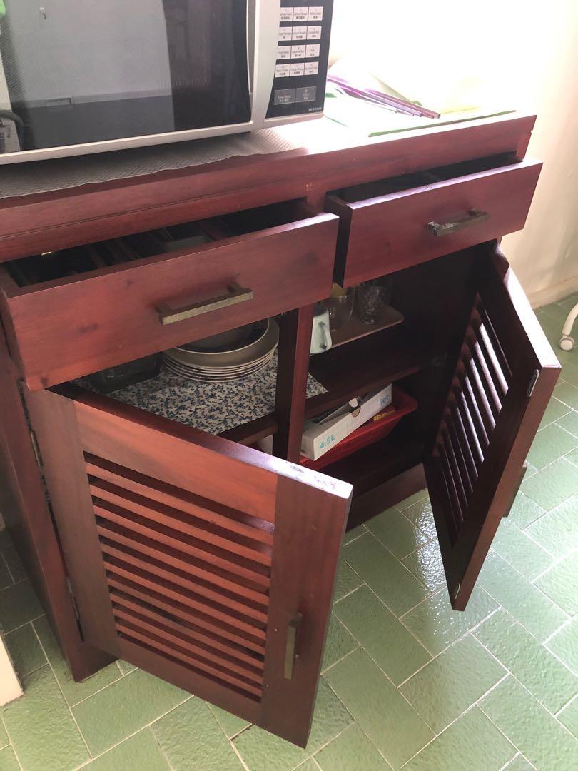 Solid Teak Cabinet (Category: Shelves, Cabinets & Racks) located in Singapore. Submitted by monstercl (Listing ID 1148565607, Image 2). Description: Wonderful teak wood piece like new. Solid quality piece bought at $600..