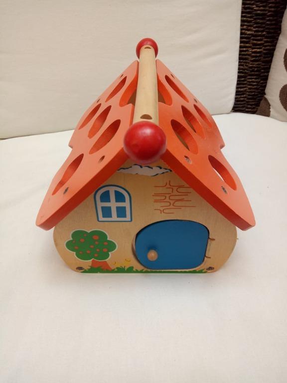Wooden Playhouse with fruit shape sorter, clock and math feature (Category: Infant Playtime) located in Paranaque City. Submitted by quicx (Listing ID 1148498218, Image 2). Description: wooden house fruit sorter, clock and math feature *5 missing fruit pieces RFS: Outgrown MOP: BPI/BDO/RCBC/GCash & delivery fee shoulder by the buyer.