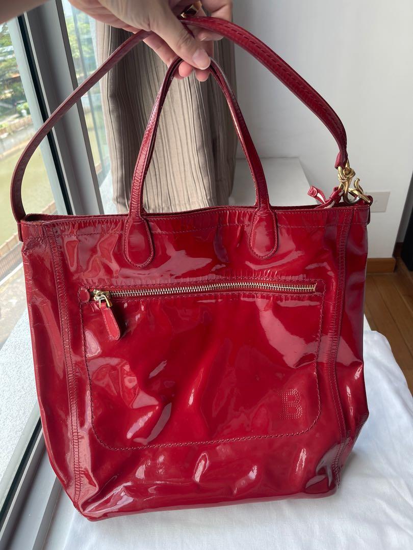 Red patent top leather handbags