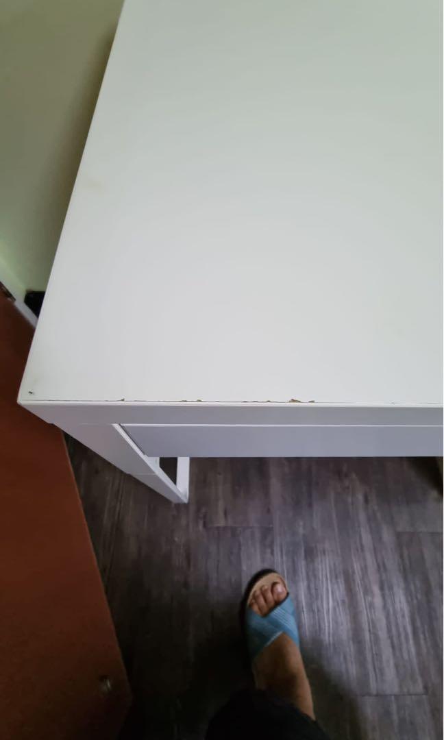 IKEA computer table (Category: Tables & Sets) located in Singapore. Submitted by eugene.khoo.334 (Listing ID 1148788013, Image 2). Description: Item was still new and drawer is still in good condition and abit tear off on the pictures or else whole table is as good as new .