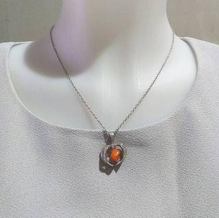 Orange stone in pretty silver tone heart pendant necklace