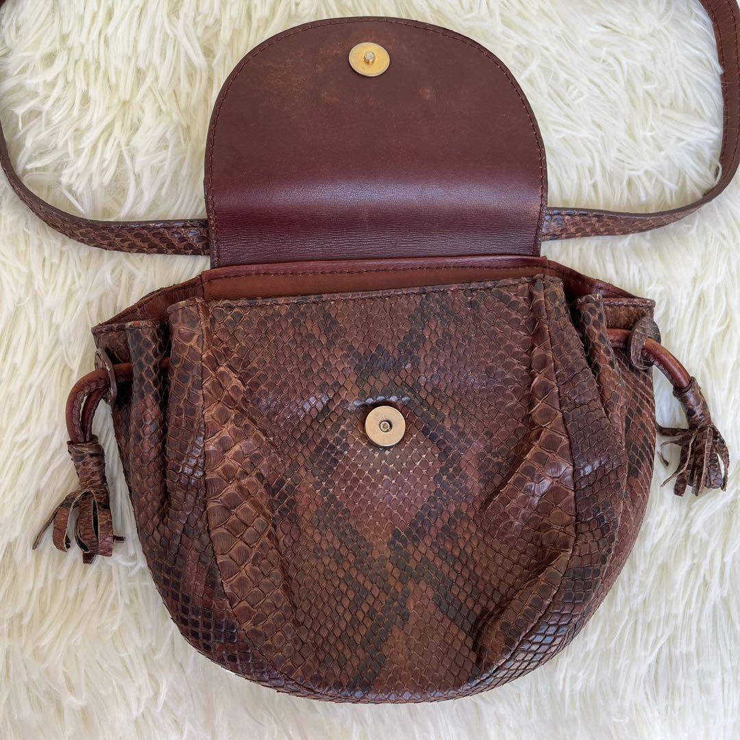 Prada Mini Python Beltbag (Category: Luxury Bags & Wallets) located in Las Pinas. Submitted by Le.Pattie.Luxe (Listing ID 1148638621, Image 3). Description: Authentic Prada Mini Python Belt Bag Super cute in person💕 ▪️Can fit iPhone15 Pro Max. ▪️Excellent used condition ▪️No major flaws to disclose ▪️Can be worn belt/body/shoulder bag .