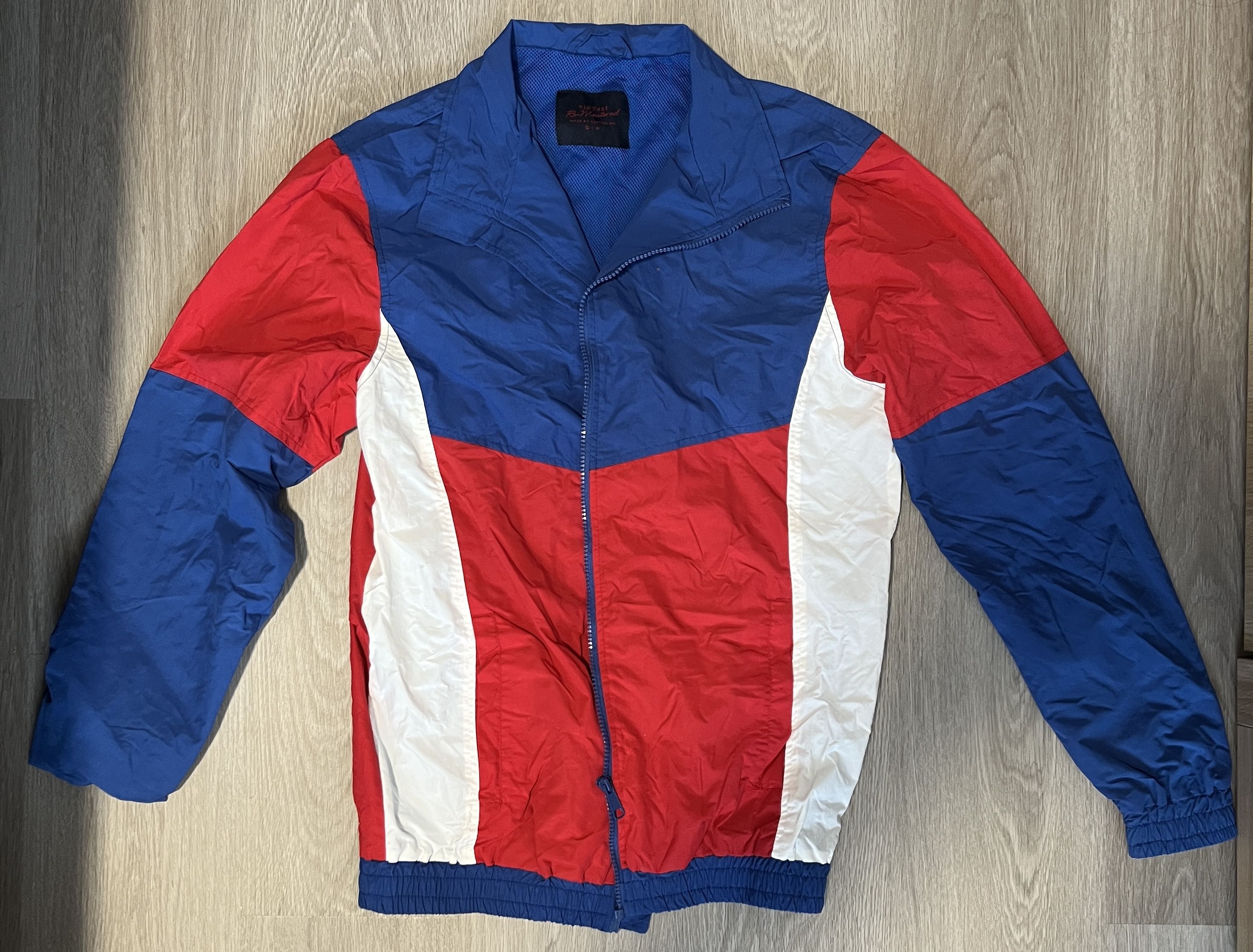 Red blue sale and white windbreaker