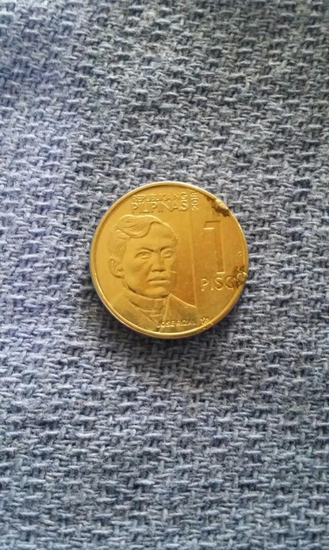 1 piso NGC 2018 error coin (Category: Currency) located in Candon. Submitted by sniper_25 (Listing ID 1148970496, Image 2). Description: 1 piso NGC 2018. error(extra metal on rim front & back).