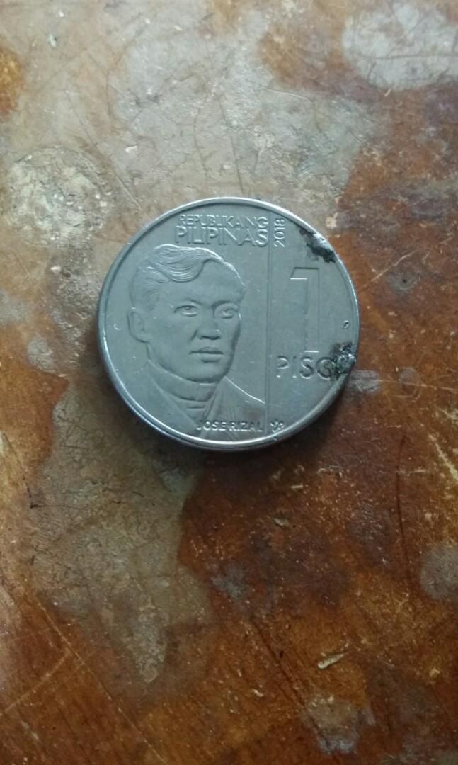 1 piso NGC 2018 error coin (Category: Currency) located in Candon. Submitted by sniper_25 (Listing ID 1148970496, Image 1). Description: 1 piso NGC 2018. error(extra metal on rim front & back).