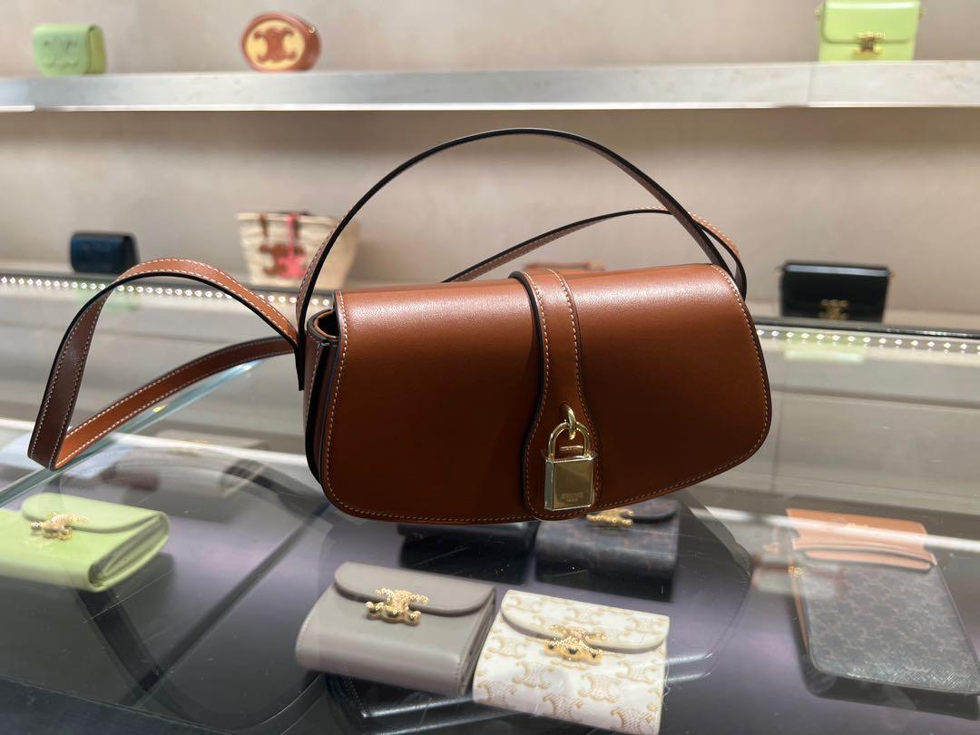 Brand new Celine clutch on strap (Tan), Luxury, Bags & Wallets on Carousell