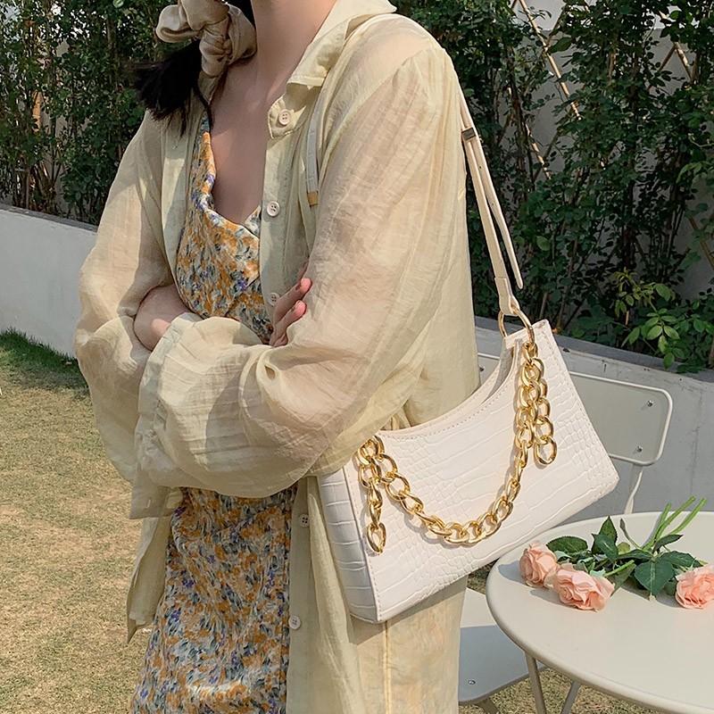 Gold croc bag hotsell