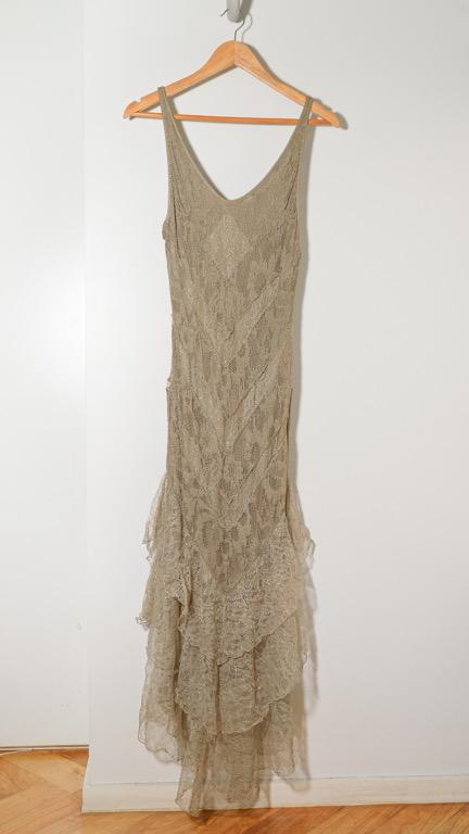 Olive and gold evening dress (Category: Evening dresses & gowns) located in Makati City. Submitted by patchdeclutters (Listing ID 1148904472, Image 1). Description: Color: Light Olive Size: Approx. XS Material: Fully lined with a stretchy olive material, Stretchy lace outer material with gold detailing Measurements: Length from top of strap to longest edge: 56 in Waist: 26 in unstretched.