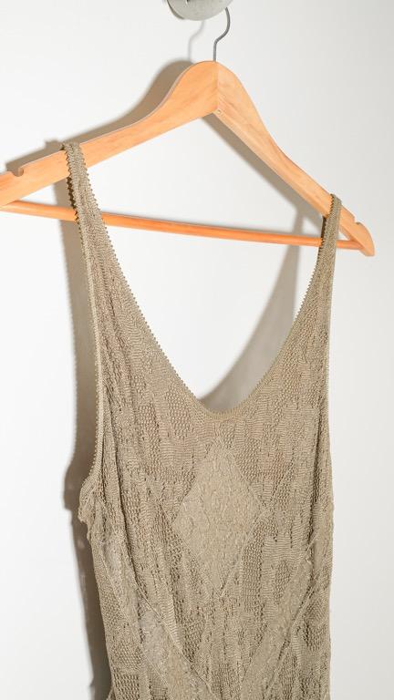 Olive and gold evening dress (Category: Evening dresses & gowns) located in Makati City. Submitted by patchdeclutters (Listing ID 1148904472, Image 3). Description: Color: Light Olive Size: Approx. XS Material: Fully lined with a stretchy olive material, Stretchy lace outer material with gold detailing Measurements: Length from top of strap to longest edge: 56 in Waist: 26 in unstretched.