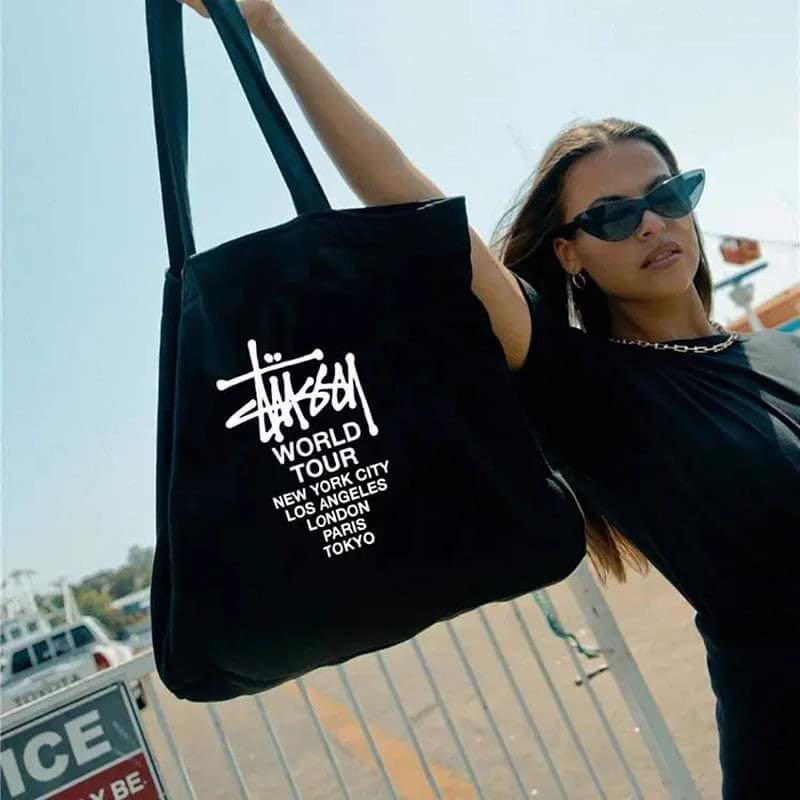 stussy world tour tote bolsa